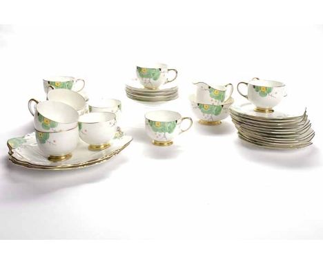 ART DECO ROYAL PARAGON PART TEA SERVICE
comprising twelve cups and saucers, twelve side plates, milk jug, sugar bowl and two 