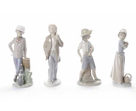 GROUP OF FOUR NAO FIGURES
modelled as one young girl holding a puppy, and three individual figures of boys, printed marks to 