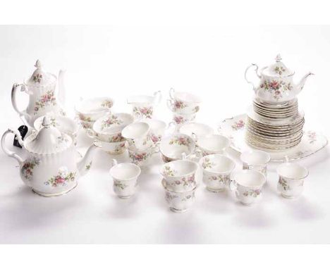 ROYAL ALBERT MOSS ROSE PATTERN PART DINNER SERVICE
comprising a teapot and coffee pot and a hot water pot, sugar and cream, o