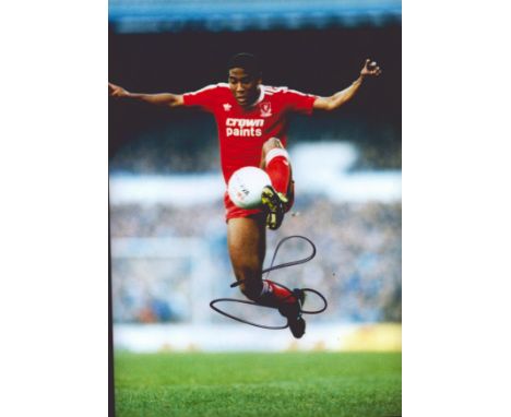 Football John Barnes signed Liverpool vintage 12x8 colour photo. John Charles Bryan Barnes MBE (born 7 November 1963) is a fo