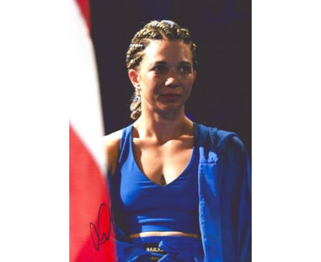 Boxing Sarah Mahfoud signed 12x8 colour photo. Sarah Mahfoud (born 29 September 1989) is a Faroese born Danish professional b