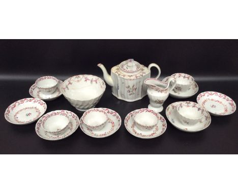 A late 18th century 'matched' New Hall porcelain tea set, comprising teapot, cream, sugar bowl, six tea bowls and saucers and