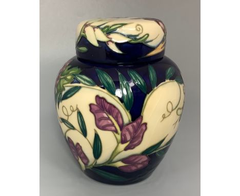 A Moorcroft pottery vase in the 'Tempest' pattern after Philip Gibson, numbered 164/250, copyright and date cypher for 2001, 