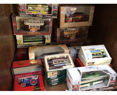 Sixteen assorted boxed die-cast model vehicles comprising Matchbox and Corgi examples including trams and a Fowler Showmans e
