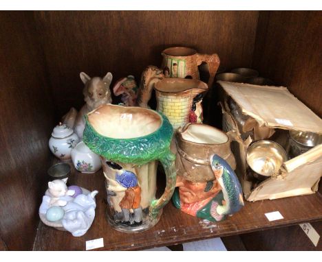 A collection of assorted ceramics including three Burleigh Ware relief moulded jugs, two NAO figures, a Royal Doulton charact