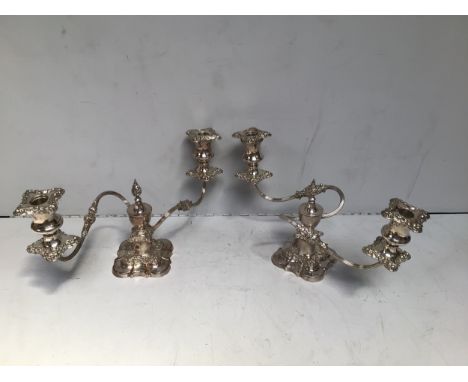 A pair of silver-plated two-light candelabra, with removable sconces, 18cm tall 
