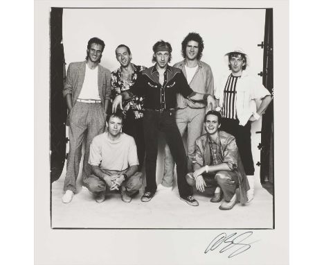 *DAVID BAILEY (b.1938) DIRE STRAITS, LIVE AID 13TH JULY 1985 Gelatin silver print, printed 1985, signed in pen by David Baile