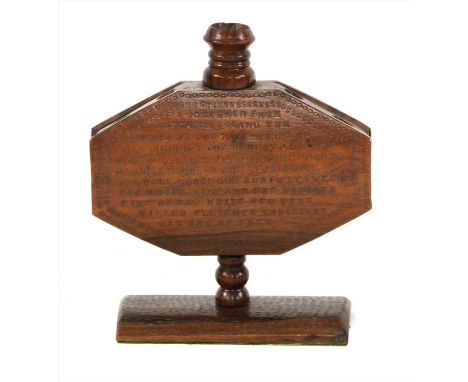 HMS BOUNTY, PITCAIRN ISLAND, mid-20th century, an octagonal-shaped hardwood candlestick, the front stamped with 'a souvenir f