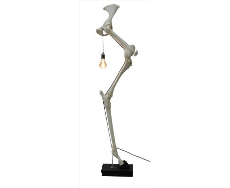 GIRAFFE LEG LAMP , late 20th century, an unusual articulated modernist style Giraffe leg bone desk lamp, 185cm high