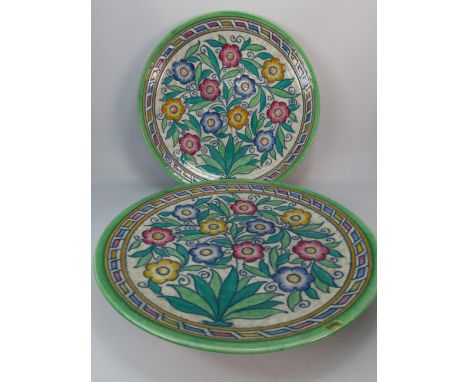 Two Large Crown Ducal Charlotte Rhead charger plates decorated with flowers both have C Rhead signed to the back. 12.5" diame