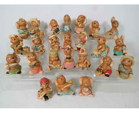 24 Pendelfin rabbit figurines.