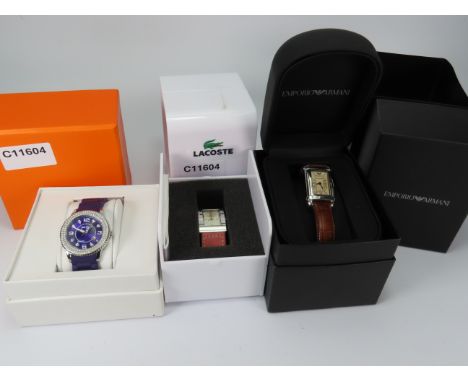 Three Designer ladies wristwatches with boxes by Emporio Armani, Fat Face and Lacoste.