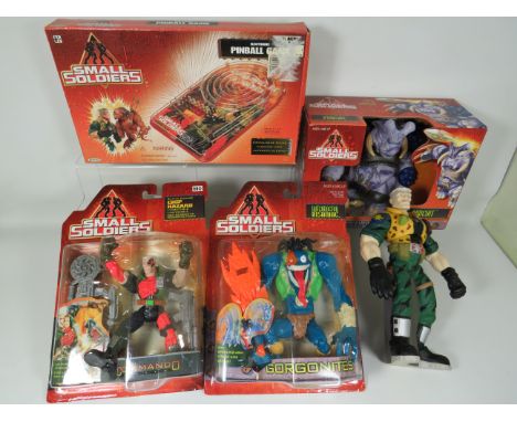 Selection of 'Small Soldiers' figures in blister packs plus a pinball machine, one Commando figure unboxed. See photos.