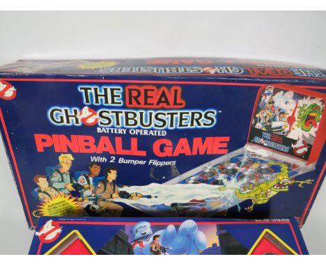 Real Ghostbusters Water zapper, cord link communications both boxed and unused plus a battery operated pinball game which has