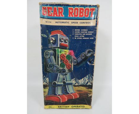 Vintage 1960's Horikawa Japanese Gear front Metal Robot with original box , battery housing is very clean. It has some damage