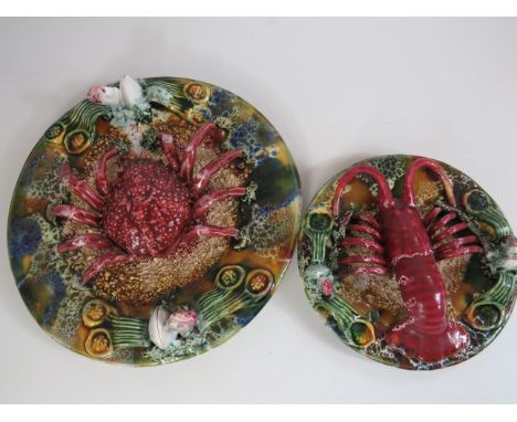 Two Spanish Porcelain Seafood platters by Lopez in the Style of Palissy. Largest measures approx 11 inches in diameter. Both 