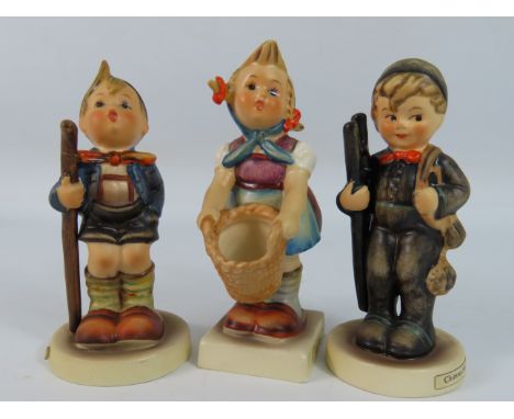 Three Goebel Hummel figurines Chimney Sweep, Little Hiker &amp; Little Helper all with TMK3 backstamp. 4" tall.