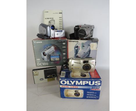 Four mainly digital cameras, Canon DC100 camcorder, Olmypus C-1000L and C-920 digital cameras, Plus a Kodak Disc 4000