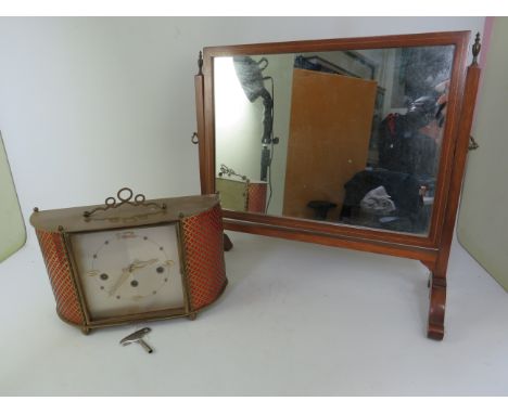 Mixed lot to include a edwardian Table top tilting mirror and a vintage matle clock in running order with key.
