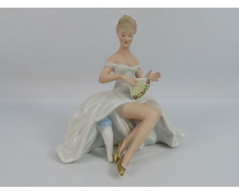 Vintage Wallendorf german porcelain figurine of a lady seated and holding a fan, 6 1/4" tall.
