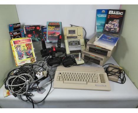 Large selection of  Commodore 64 accessories, disk drives, Keyboard, joysticks, games etc.