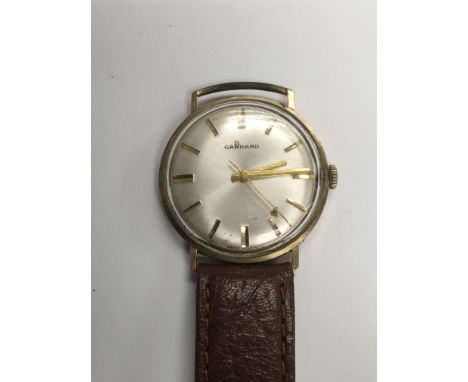 A gold Garrard gent's watch (a/f).
