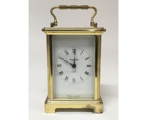 A Bayard brass cased 8 Day carriage clock with Roman numerals.