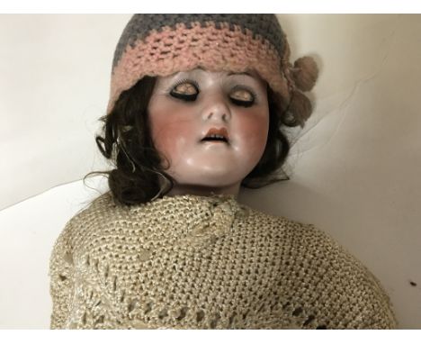 An Early 20th century bisque head doll by Max Handwerck,