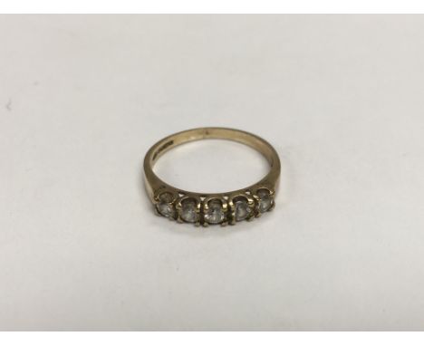 A gold five stone diamond ring, approx 1.5g and approx size K-L.