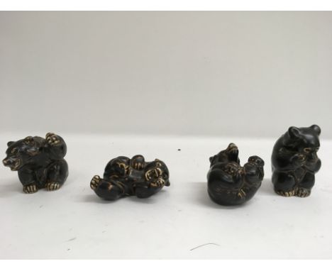 A small collection of four Ceramic Copenhagen bears.