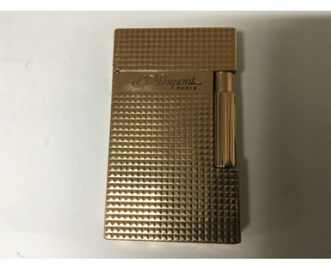 A Gold tone DuPont lighter,