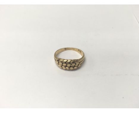 An 18ct gold ring. Weight approx 3.57g, size approx K/L.
