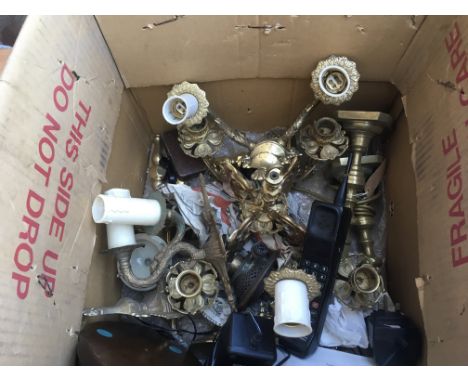 A box containing a collection of chandelier and lighting components and pieces to also include a Motorola mobile phone. Also 