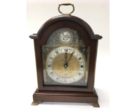 A mahogany Garrard clock.