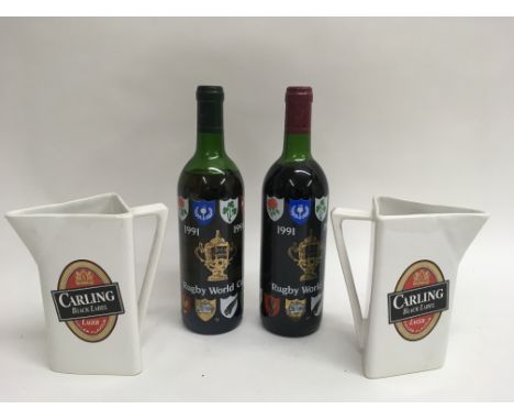 Two bottles of Bordeaux wine commemorating the 1991Rugby World Cup plus two Wade Carling lager jugs