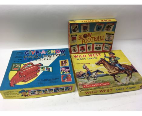 3 boxed games including Wild West Race Game, Blow Football and Chad Valley Give-a-Show projector.