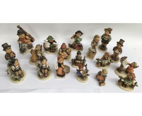 A collection of Goebel child figures