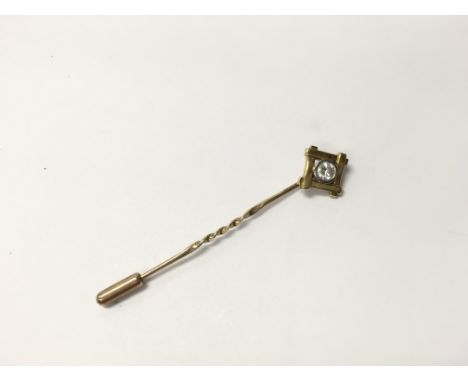 A diamond stick pin. Weight approx 2.90g