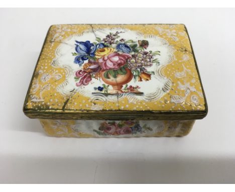 A 19th century yellow ground enamel trinket box with floral painted reserves. Approx 6x8cm, some damage