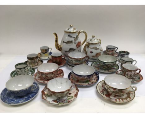 A collection of 20th Century Japanese and Chinese export porcelain and a Carltonware cruet set.