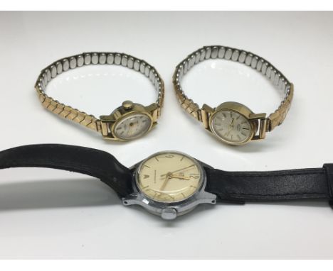 Three wristwatches including a ladies Rotary.