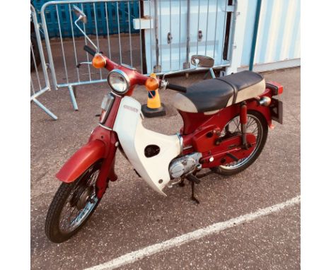 A Classic 1976 Honda C70 Cub Step Thru Scooter Moped Motorcycle with MOT. The bike is very original and overall is in good co