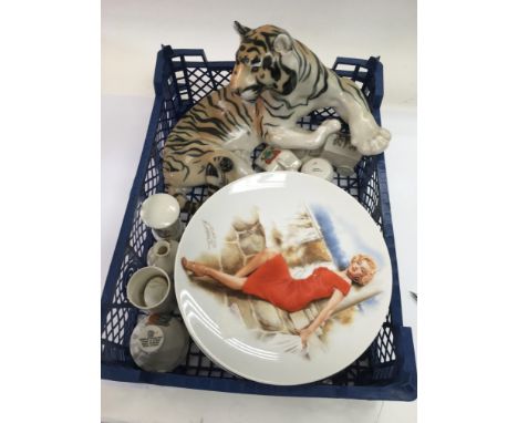 A box of ceramics including Marilyn Monroe series plates, Lomonosov tiger and some crested ware.