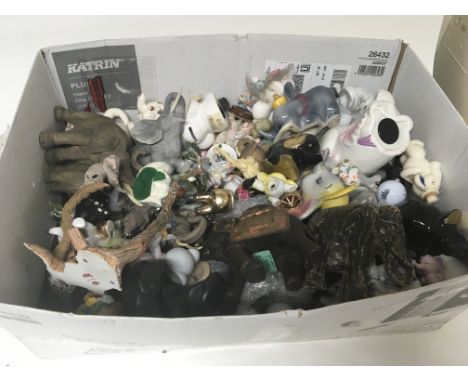 A box containing a large quantity of ceramic and other elephant figures.