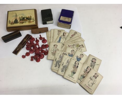 A late 19th century/ early 20th century set of pictorial snap by Jacques, Edwardian cased die, part chess pieces and other pl