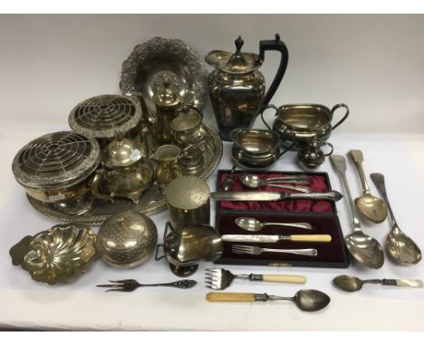 A collection of silver plated items including a tea service, rose bowls, cutlery etc.