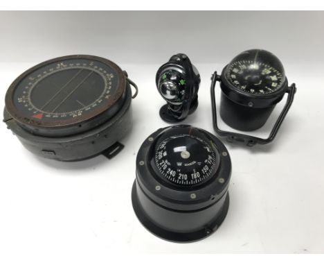 A collection of 6 compasses, a brass barometer, a boxed bracket mounted flasher echo sounder and a seafarer 3 etc.