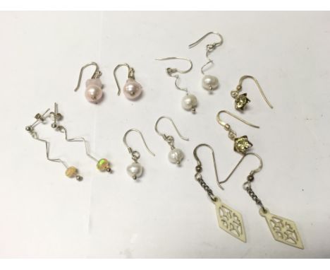 6 pairs of silver earrings including cultured pearls, opal beads etc.