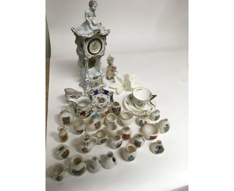 A painted continental porcelain dish, Royal Worcester example a/f, a decorative clock and crested china