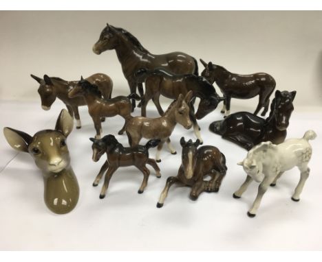 A collection of ceramic horse and donkey figures comprising mainly Beswick examples.